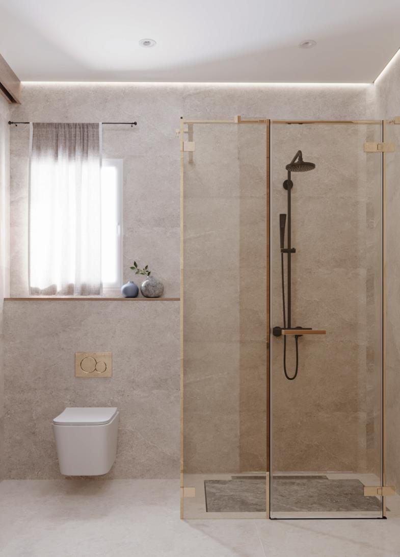 Festival Living: The shower in warm stone and brushed gold