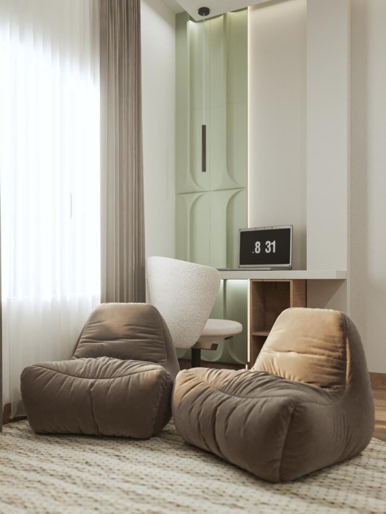 Festival Living: A reading corner in bedroom two, beside the sage panelled desk