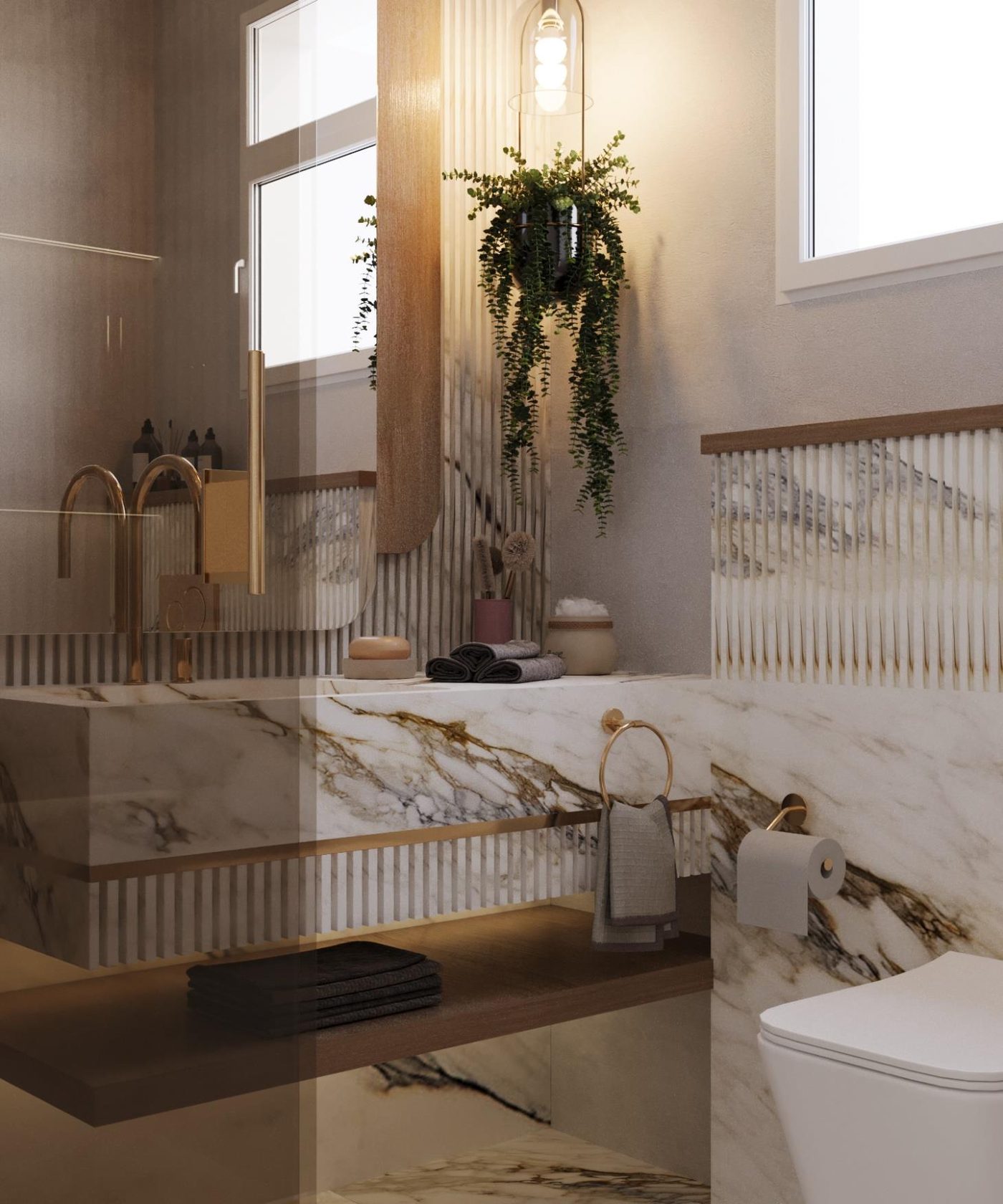 Mountain View: The bathroom in fluted marble and brushed brass